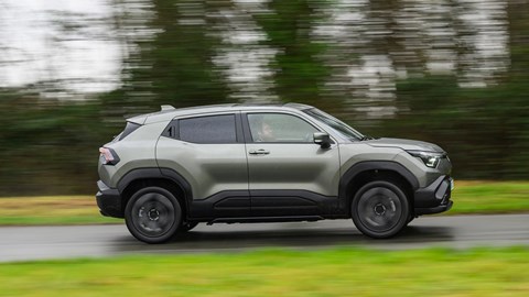 Suzuki eVitara review, driving, side view