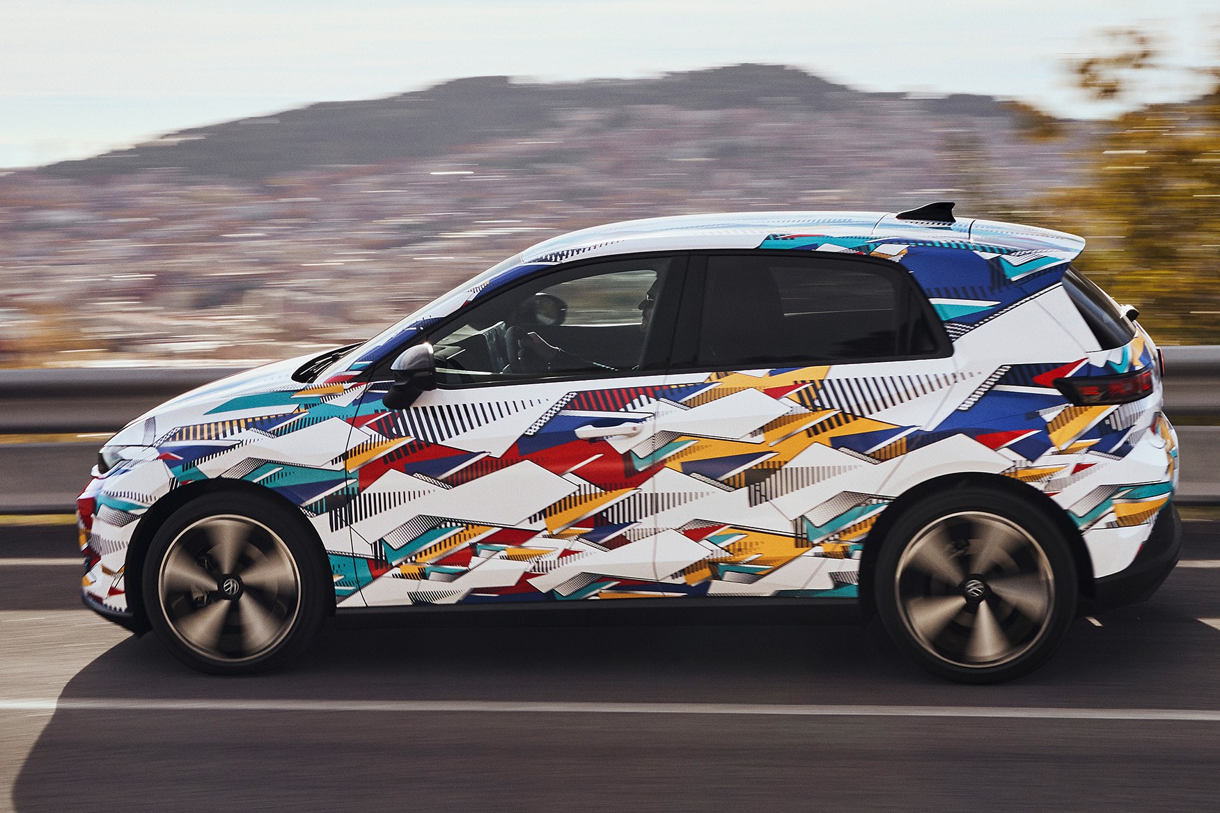 Volkswagen ID. Polo prototype, camouflaged exterior, front three-quarters | CAR