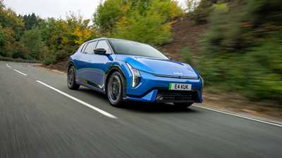 Kia EV4 (2025) review: front three quarter driving, blue paint