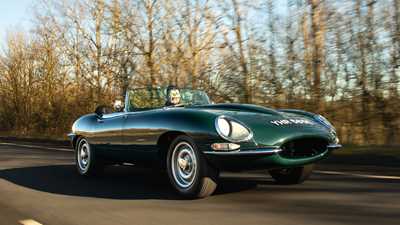 Jaguar E-Type by E-Type UK (2025) review: front three quarter tracking, green paint, low angle