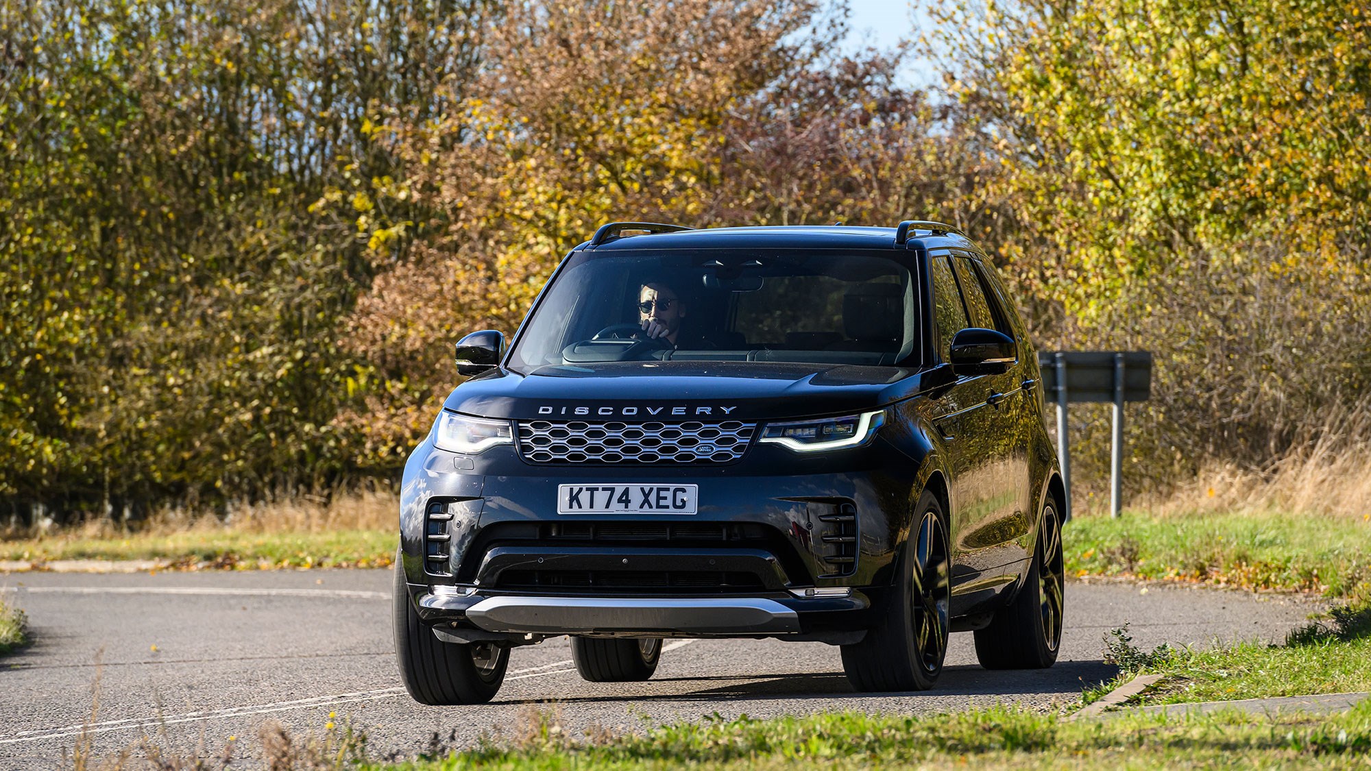Land Rover Discover (2025) review: front three quarter cornering, black paint