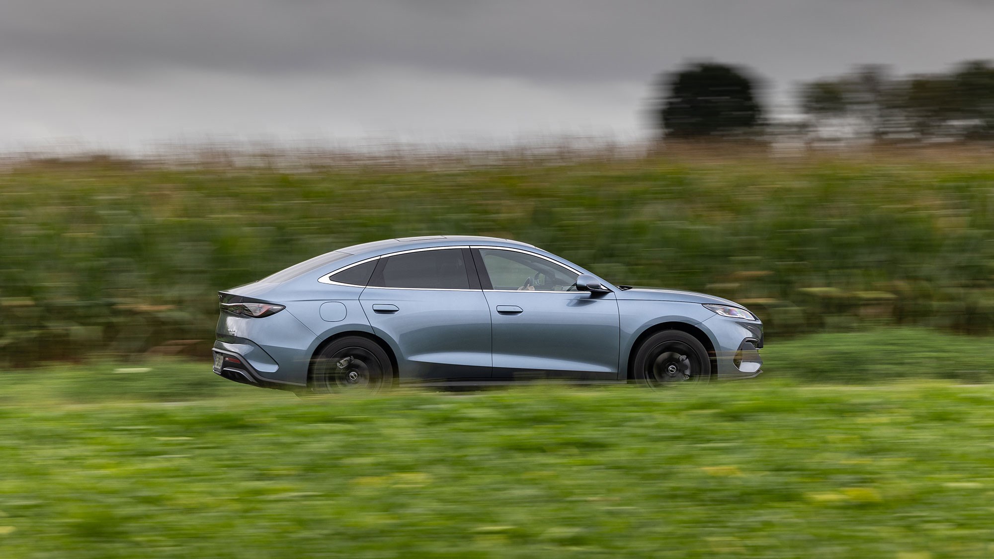 BYD Seal 6 DM-i saloon (2025) review: side view driving, blue paint