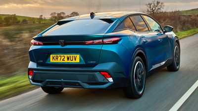 Peugeot 408 crossover review on CAR magazine - rear view, driving, countyrside