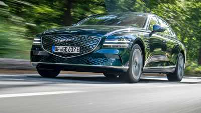 Genesis Electrified G80 review, front view, driving