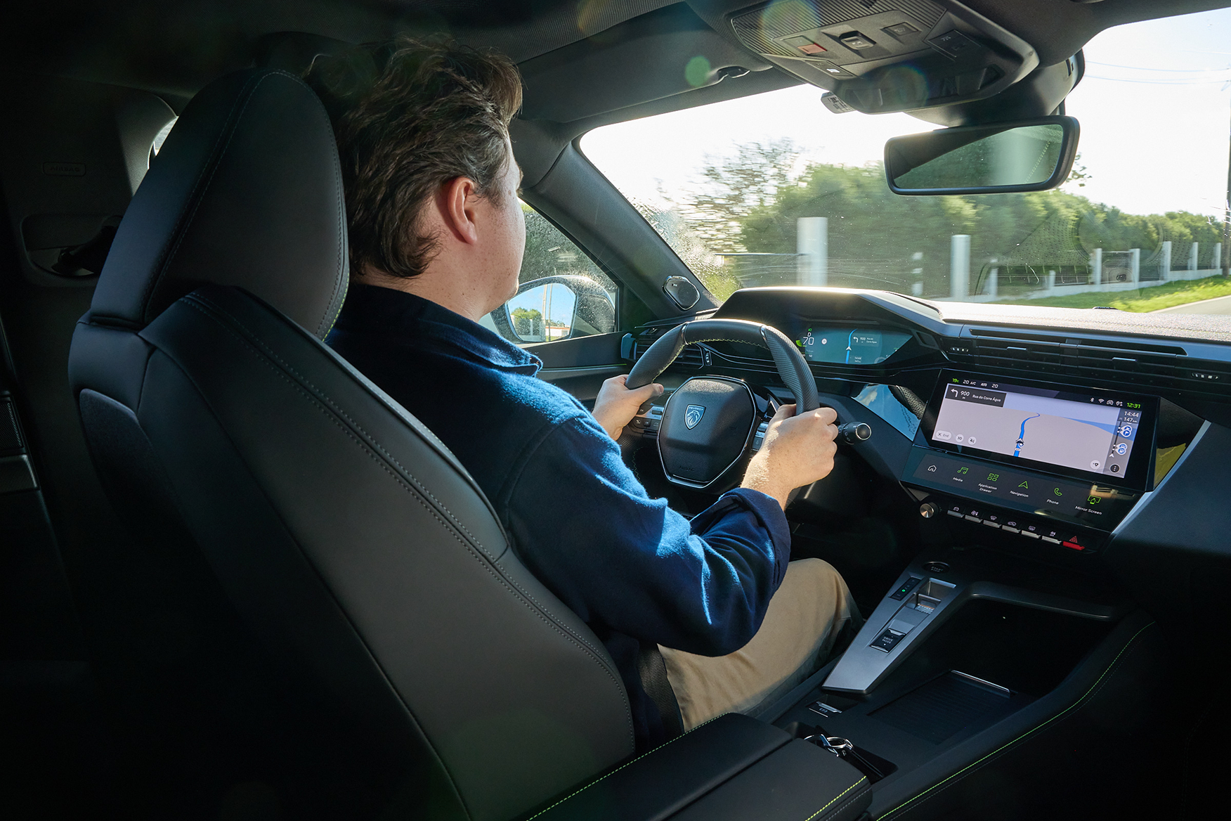 Ryan Gilmore driving the Peugeot E-308